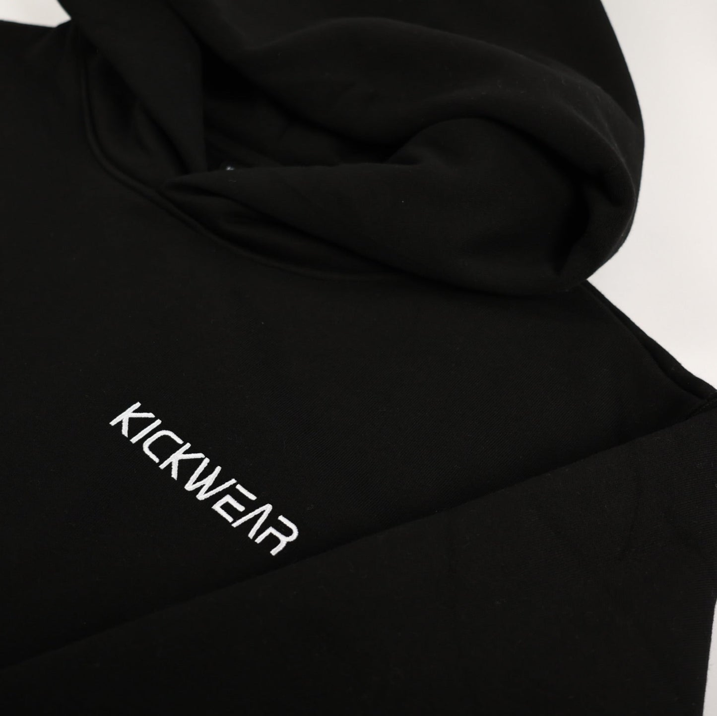 Kickwear Pitchside Fleece Black Essentials Comfy Lining Warm Lounge Hoodie Pullover White Logo Cuff Sleeves Close up